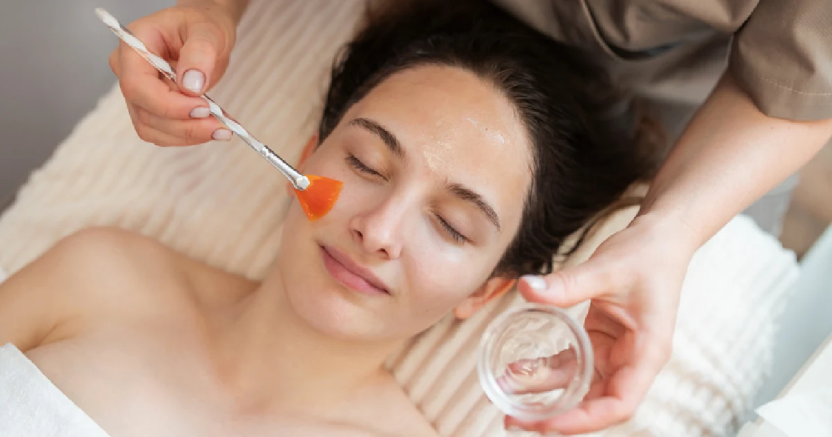 On a woman’s face, applying the BioRePeel In Pace, FL